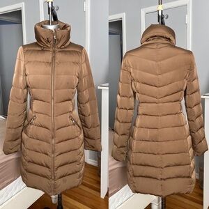 Zara Womans down puffer coat in size M (fits more like a S) in camel color.